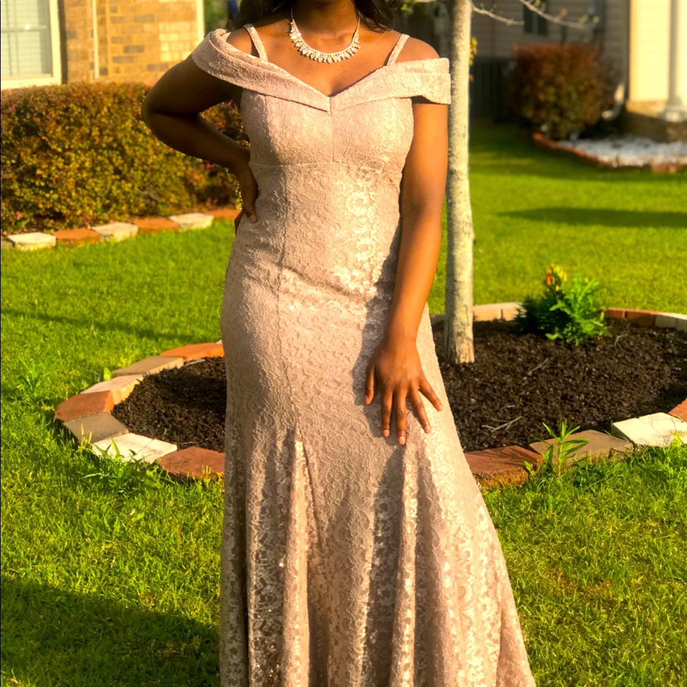 Champagne colored long evening gown with off the shoulder straps
